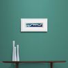 Narrow Blue White and Teal Waves Print in Framed in White on a Blue Wall Above Dark Shelf and Vase Set