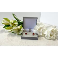 Sterling silver orange (Hessonite) garnet earrings in a box